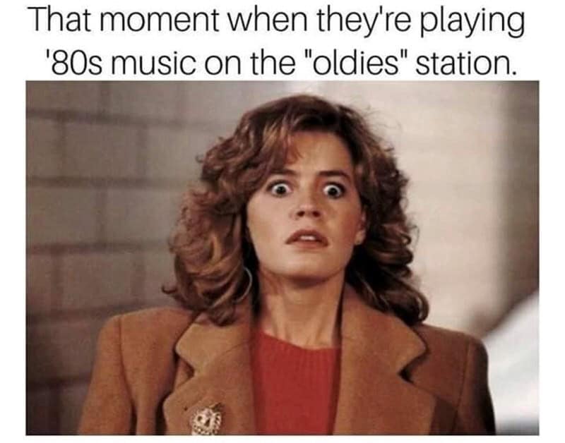 Woman with surprised expression listening to 80s music on old-fashioned radio.