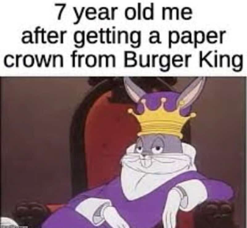 Playful meme image of a rabbit with a paper crown, highlighting childhood nostalgia and humor for Ge.