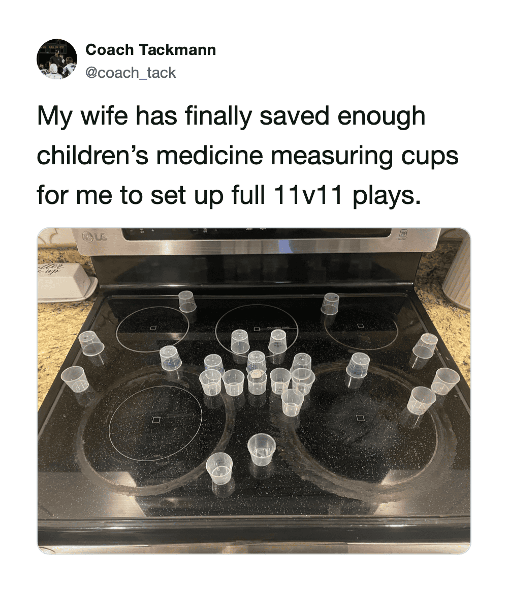 "Children's medicine measuring cups on stovetop for 11v11 game setup".