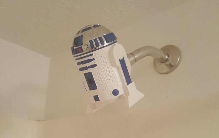 R2-D2 themed shower head resembling the iconic Star Wars droid.
