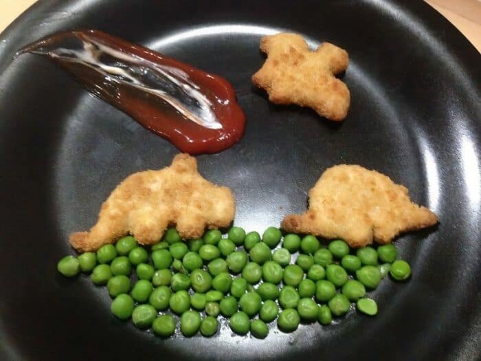 Funny men wholesome food meme with peas and chicken nuggets.