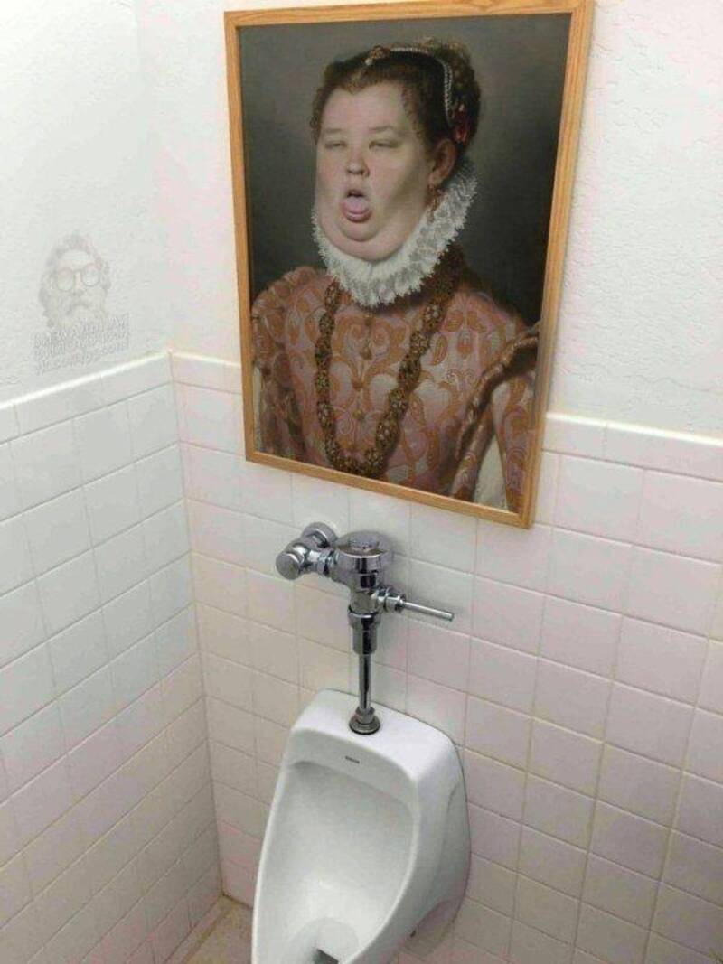 Humorous portrait of a woman with a funny facial expression reflected in a bathroom mirror.