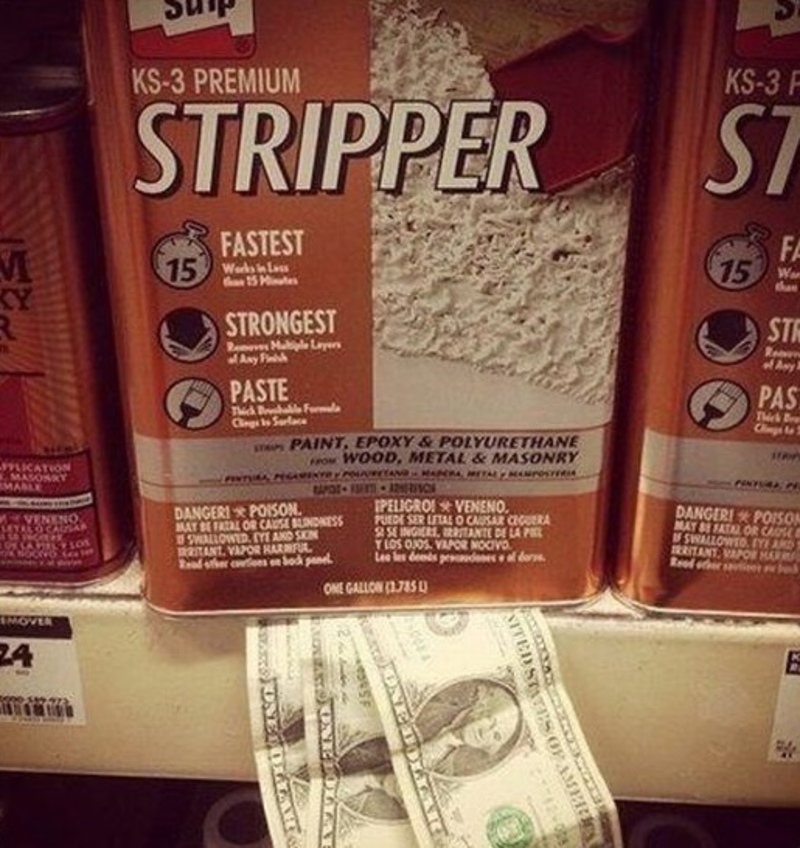 Can of stripper paint and epoxy for walls, with dollar bills underneath.