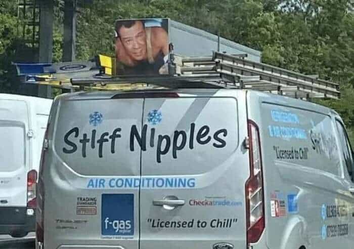 "Stiff Nipples" air conditioning van with a ladder on top and a large poster of a man's face.