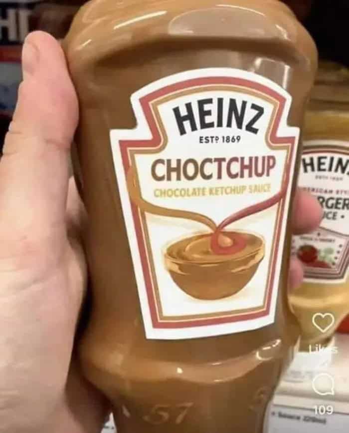 HEINZ CHOCTCHUP Chocolate Ketchup Sauce in a jar, hand holding it.