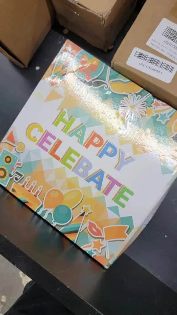 HAPPY CELEBRATE colorful birthday cake with balloons and confetti design.