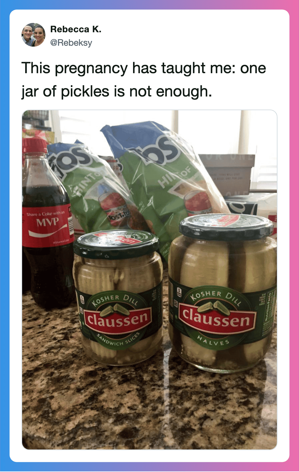 Jar of Claussen pickles with soda and snack bags on kitchen counter.