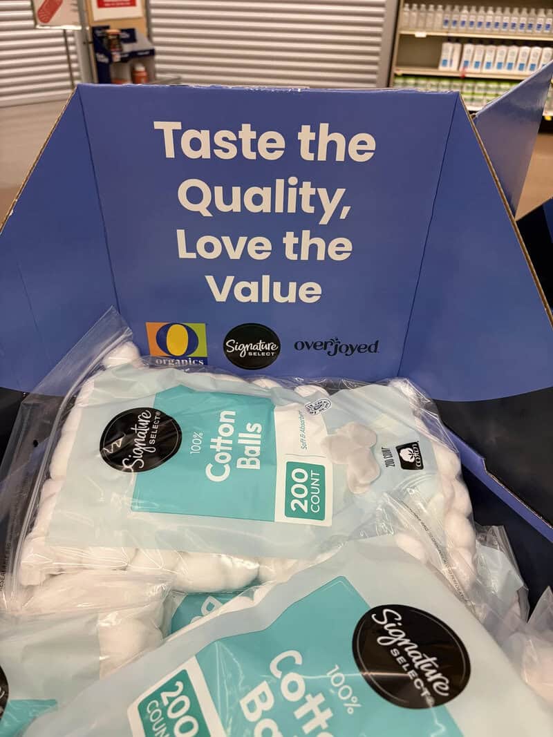 Cotton Balls in a retail display box with a sign promoting quality and value. Perfect for personal o.