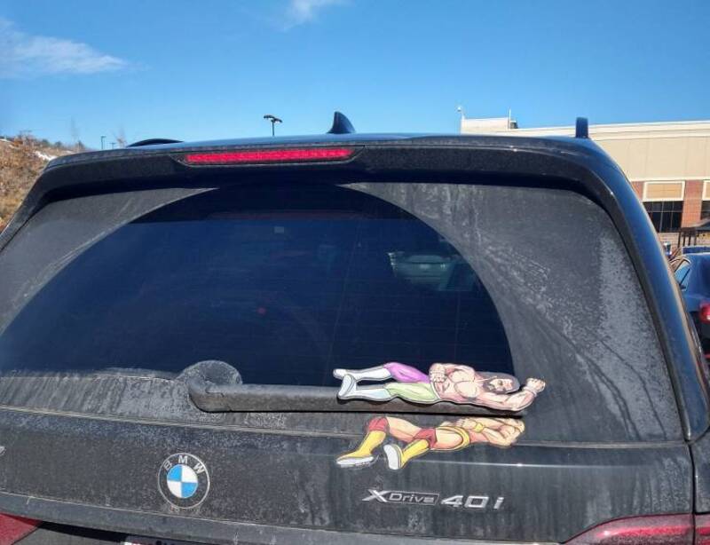 Socks on car rear window, humorous random picture from Pleated Jeans.