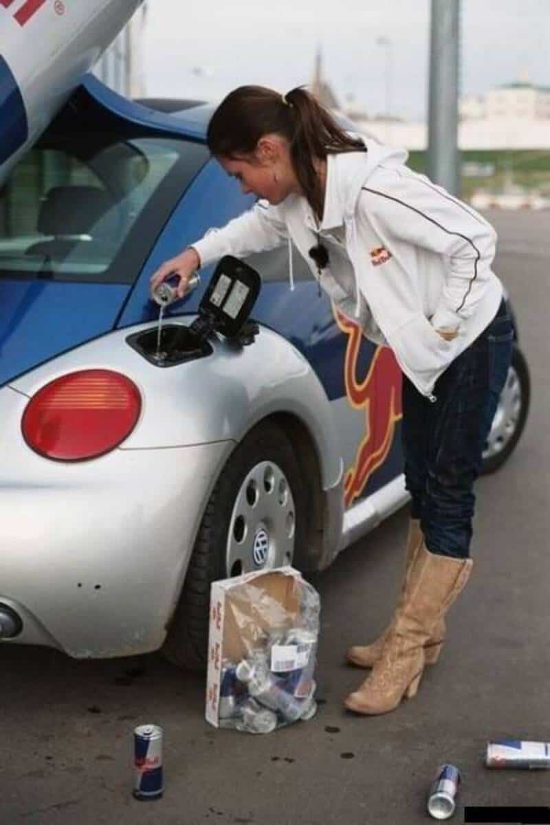 Funny random pictures, woman pouring liquid into car trunk with soda cans, humorous scene.