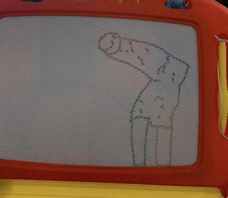 Giraffe illustration on magnetic drawing board for children, colorful and playful art toy for kids'.