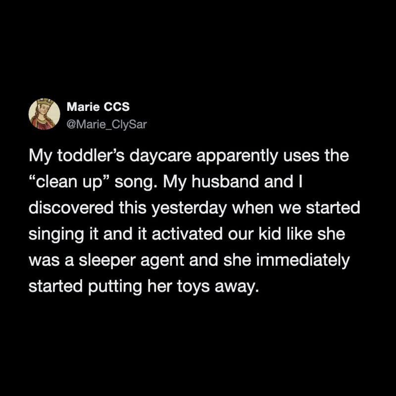 Toddler in daycare reacting to "clean up" song, toys being put away.