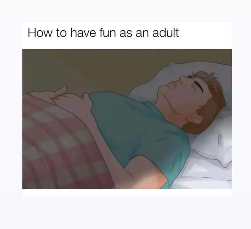 Relaxed adult lying in bed with a content smile, illustrating fun ways to enjoy adulthood.