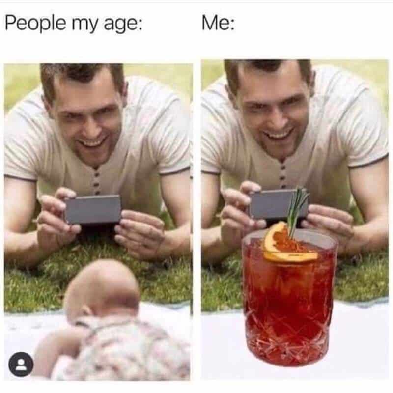 Humorous comparison of people looking at their phones with a drink.
