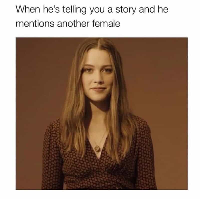 Woman with a subtle smile, representing feeling overlooked when telling stories.