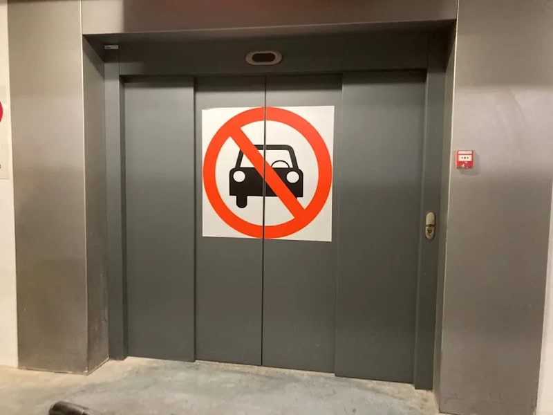 No parking sign on elevator door.