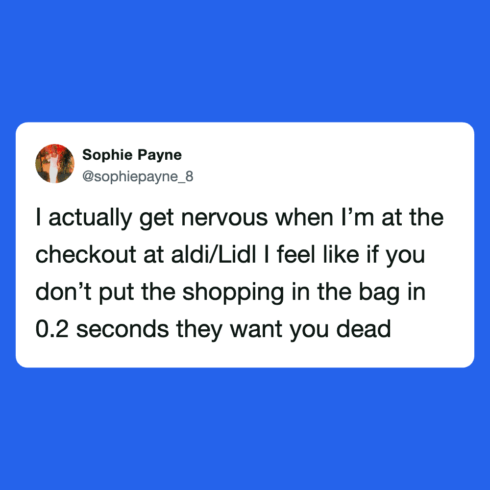 Person feeling nervous at Aldi checkout counter, worried about quick shopping process.