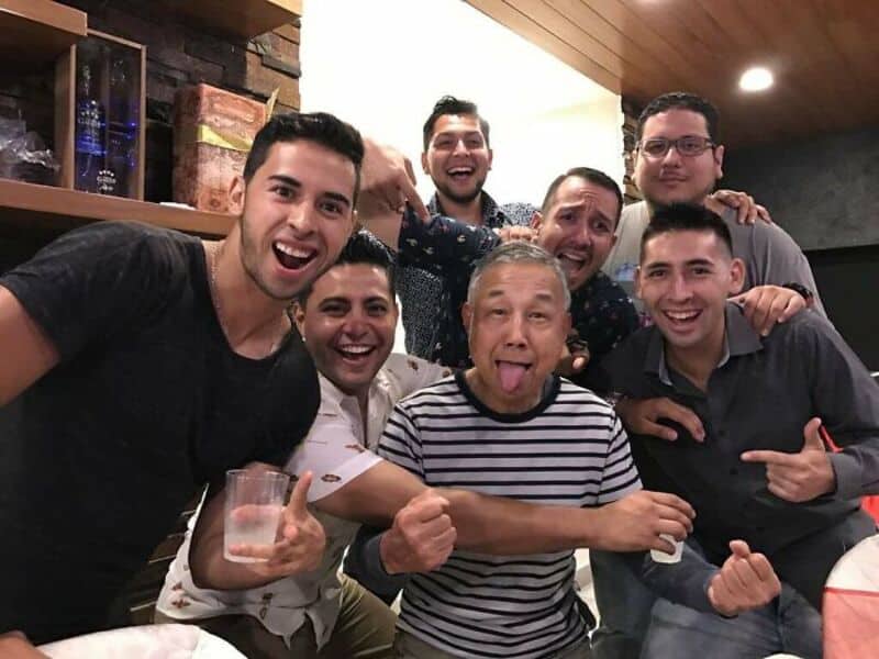 Celebrating friendship and good times with friends at a lively indoor event.