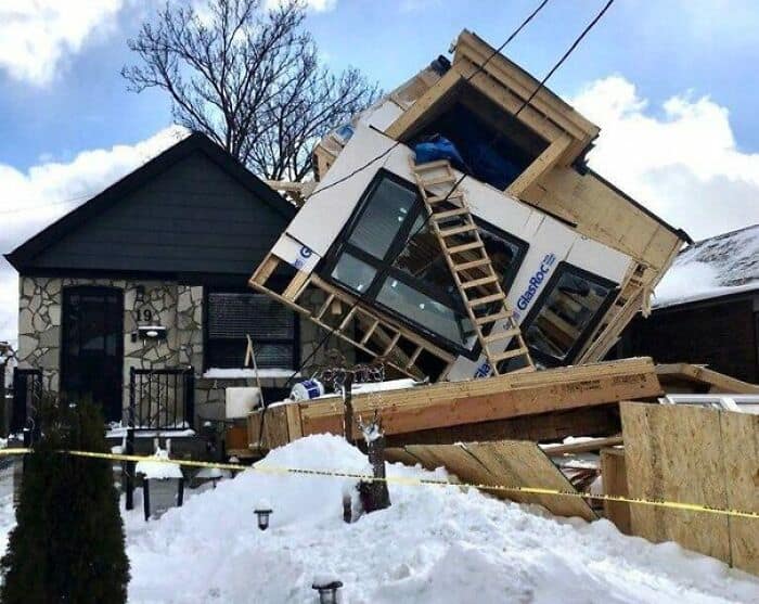 House construction mishap with a tilted second floor.