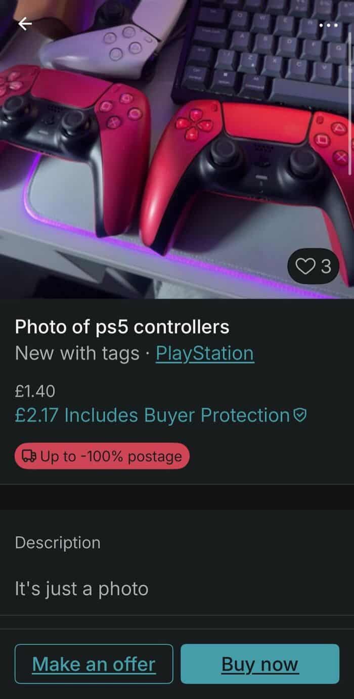 PlayStation 5 controllers in red and black on gaming desk with keyboard and neon lighting.