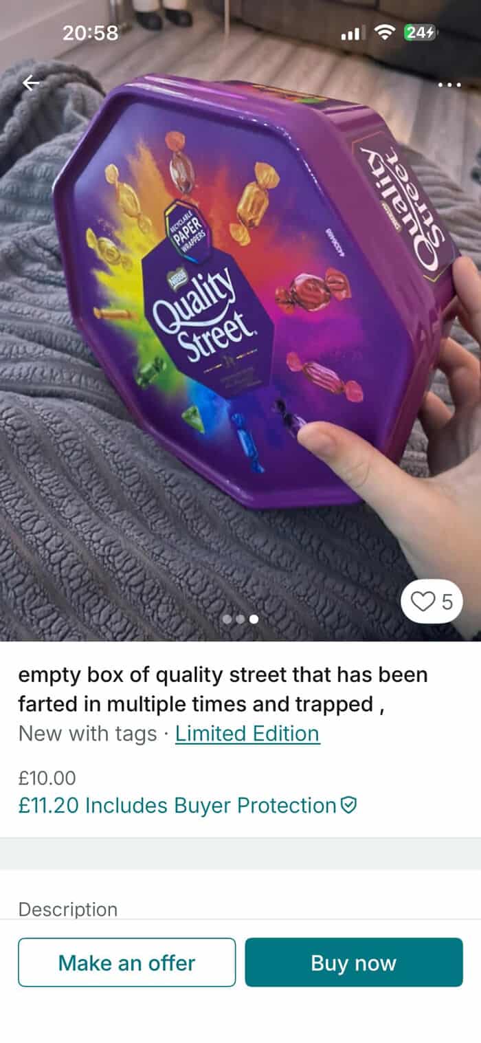 Limited Edition purple Quality Street tin with assorted chocolates and candies for sharing or giftin.
