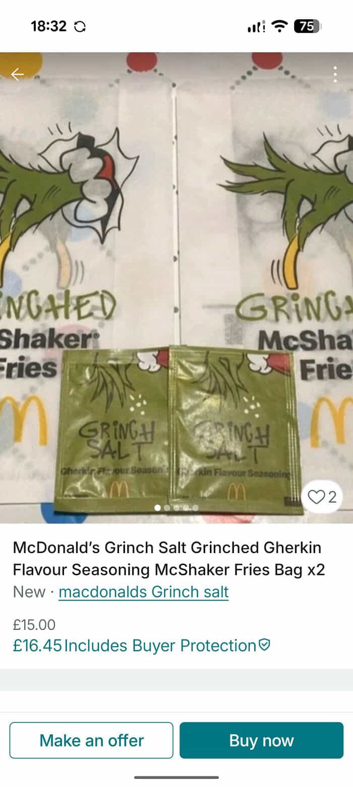 McDonald's Grinch Salted Fries bag with festive design, perfect for holiday season snacking.