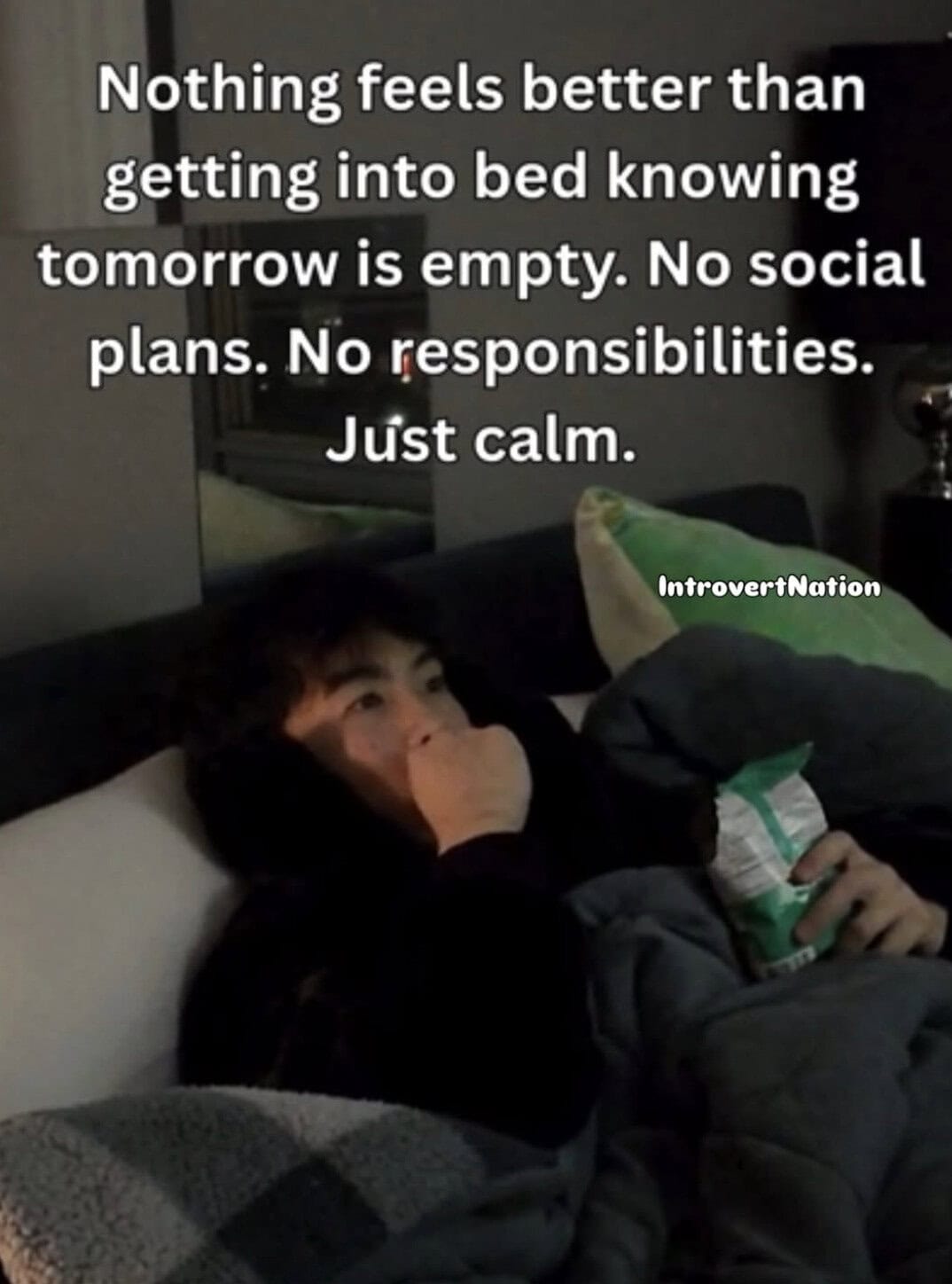 Relaxed woman lying in bed with a snack, with overlaid text about the comfort of staying in bed.