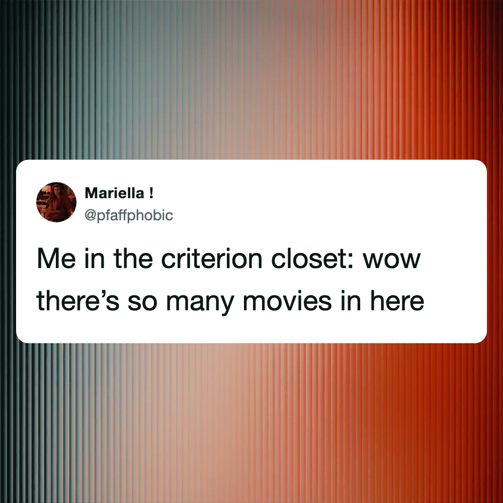 Person in the criterion closet with many movies in the background.