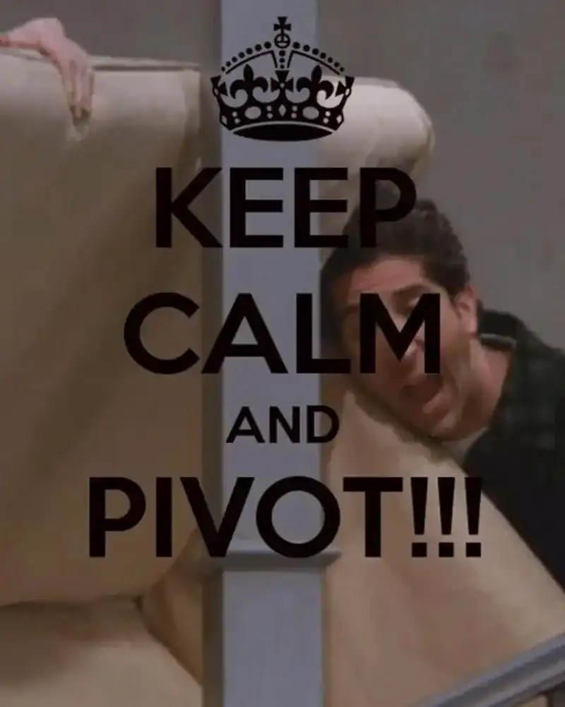 Man peeking from behind a couch with "Keep Calm and Pivot" text overlay, humorous scene.