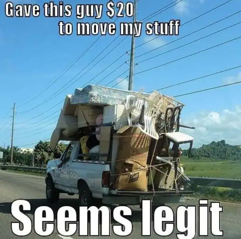 Overloaded moving truck with furniture and boxes on highway, humorous caption about legitimacy.