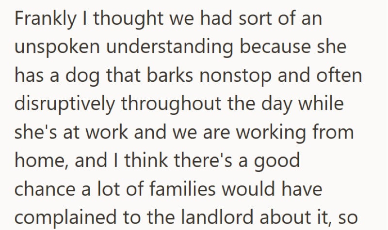 A dog barking nonstop while a woman speaks, with a man sitting nearby in a home setting.