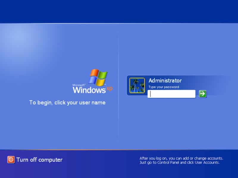 Windows XP login screen showing administrator login prompt and password field.