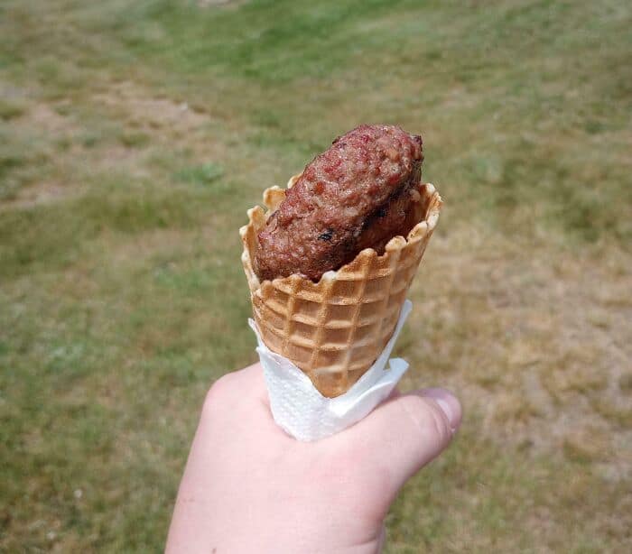 Fried meatball served in a waffle cone, humorous take on cursed food.