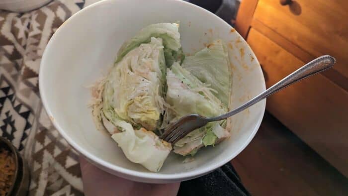 Unappetizing lettuce wraps with spoiled ingredients, looking unappealing and strange.