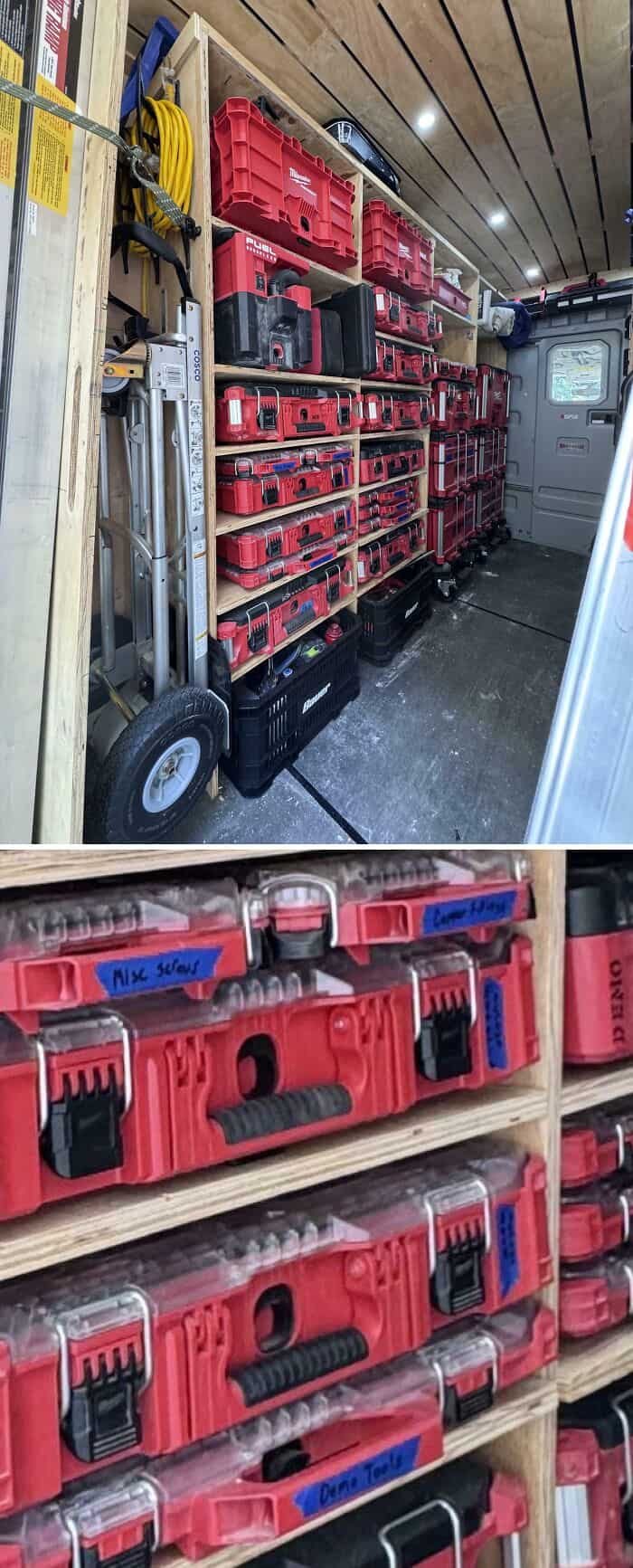 Well-organized garage with red tool storage cases on shelves.