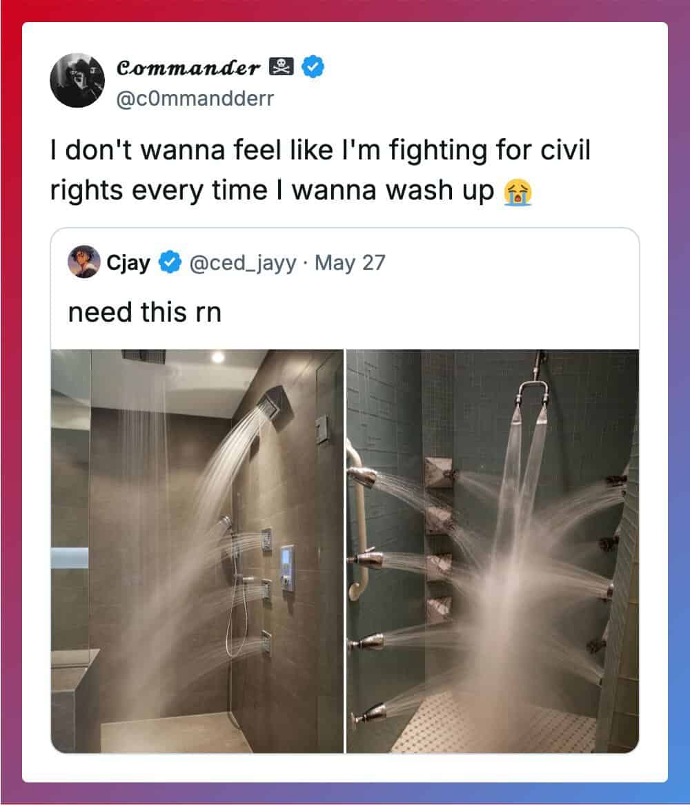 Two shower heads spraying water in a bathroom, one with a rain shower and multiple jets.