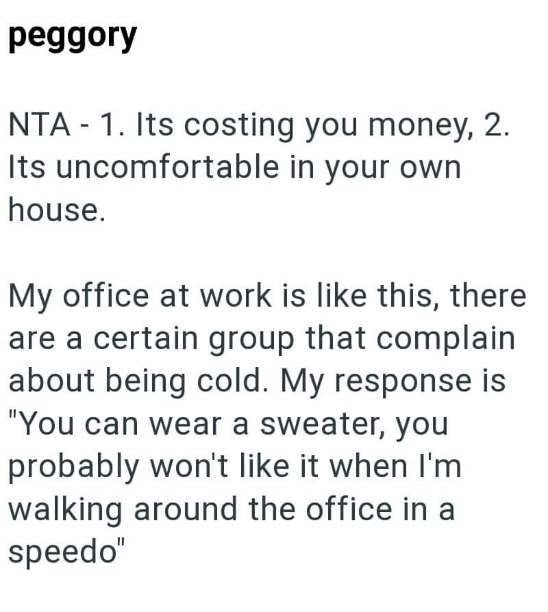 Office with cold temperature complaints, person in sweater, uncomfortable environment.