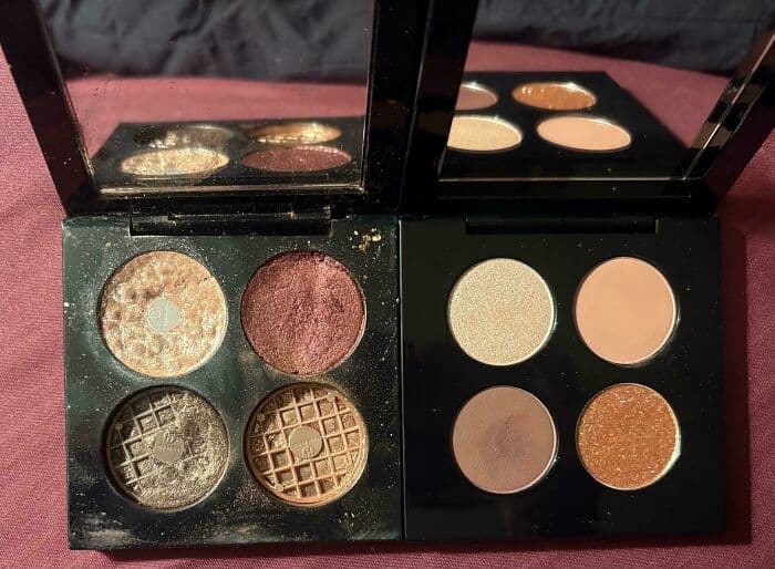 Eyeshadow palette with four shades, two shimmery and two matte, in a black case.