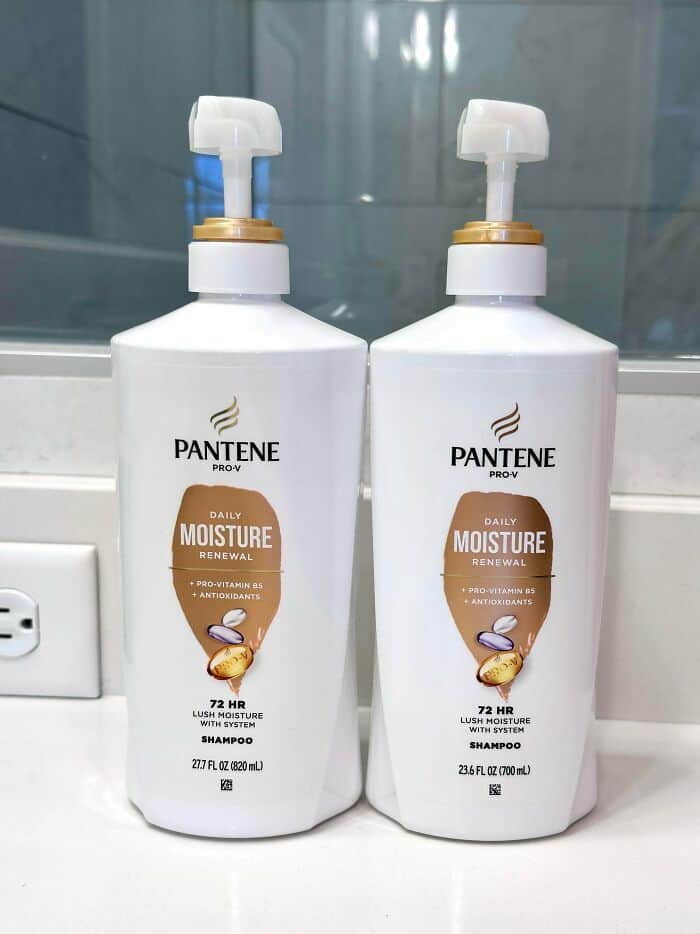 Pantene Pro-V Daily Moisture Renewal Shampoo bottles on a bathroom counter.