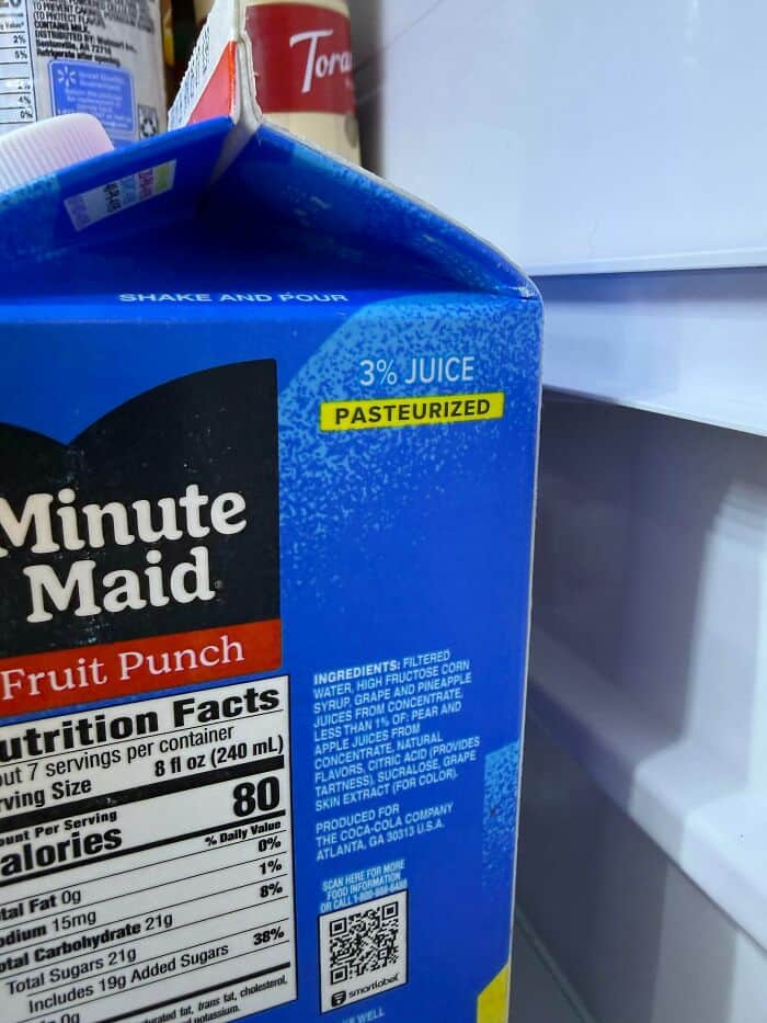 3% Juice Pasteurized fruit punch carton on store shelf.