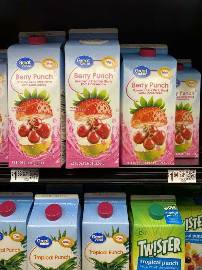 Berry Punch flavored juice boxes from concentrate, with strawberries and cherries on the packaging.
