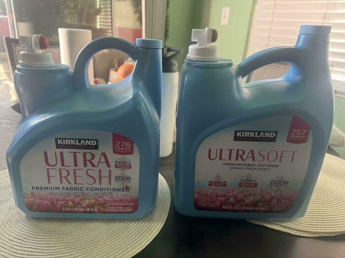 ULTRA FRESH and ULTRA SOFT Kirkland laundry detergents in blue bottles.