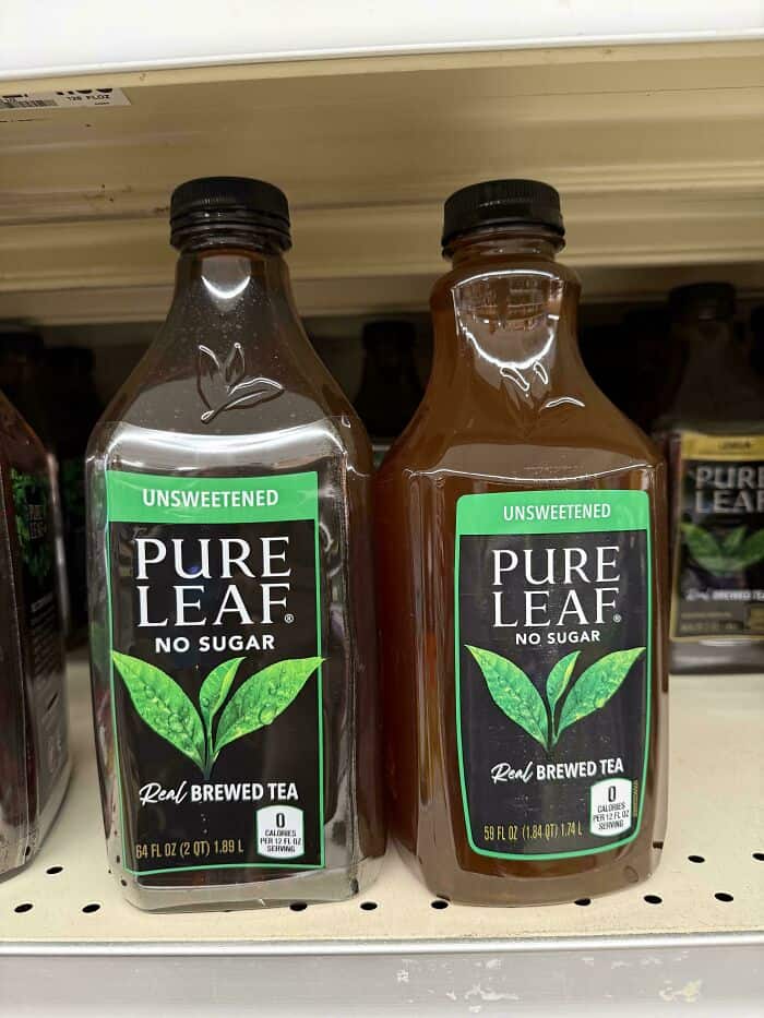 Unsweetened Pure Leaf No Sugar bottled tea on store shelf.