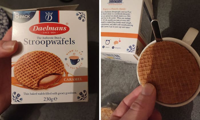 Daelmans Stroopwafels caramel box and mug with a stroopwafel on top, held by a hand.