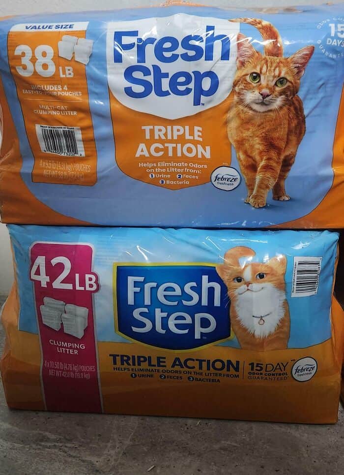 Fresh Step cat litter bags, 38 lb and 42 lb, with orange and blue packaging.