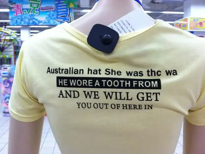 Yellow T-shirt with humorous misspelled Australian hat quote in black text.