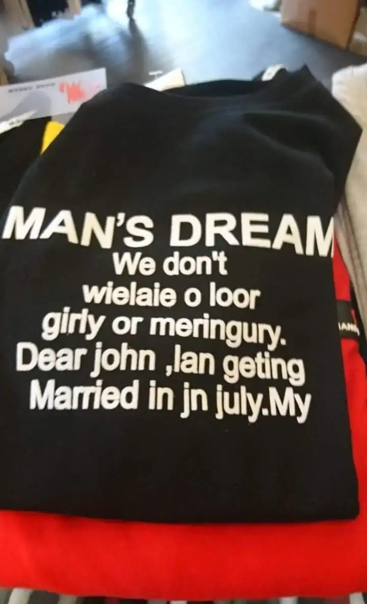 Black T-shirt with humorous misspelled wedding message for men.