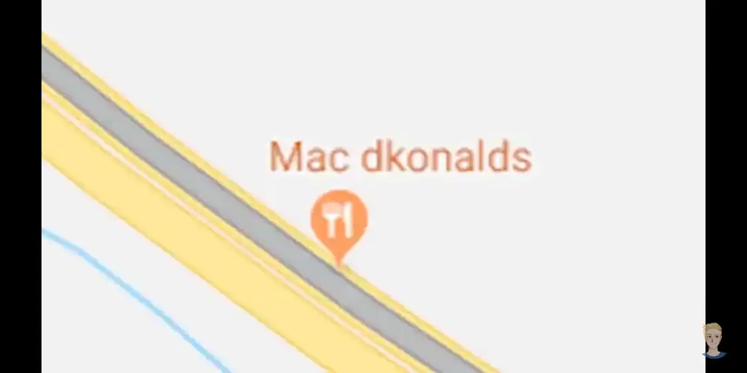 Humorous spelling mistake of "McDonald's" on a sign.