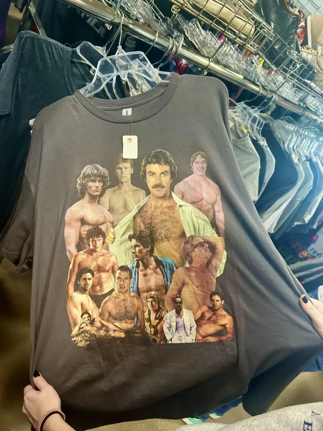 Vintage movie graphic T-shirt with shirtless male actors from classic films.