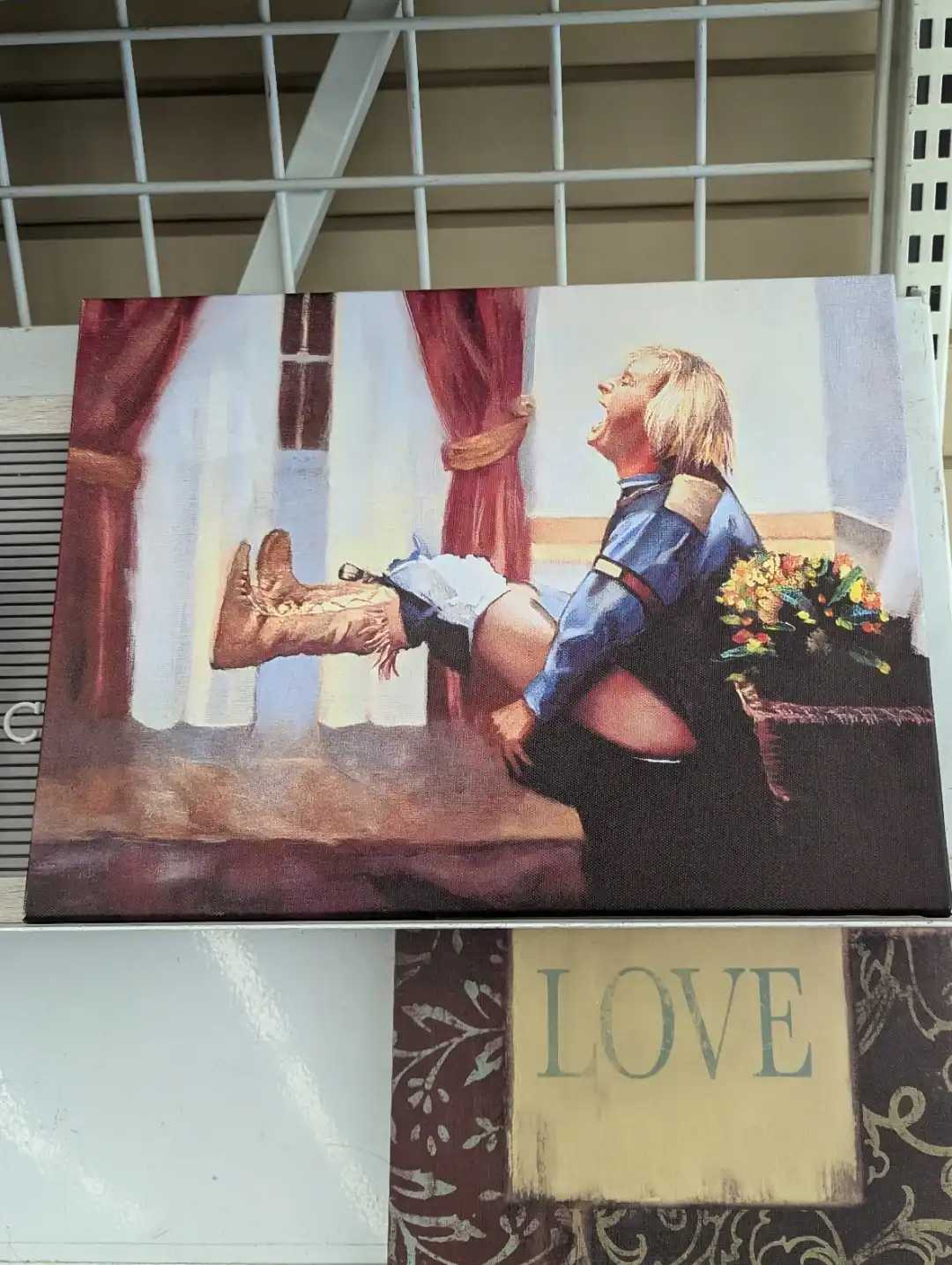 Colorful thrift store painting of a woman laughing, holding her shoe, with a window and curtains in.